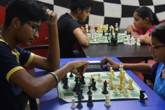 Indian students play chess