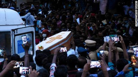 Residents gather as they carry the coffin of Jayaraj and son Bennicks Immanuel, who were allegedly tortured at the hands of police in the Indian state of Tamil Nadu. 