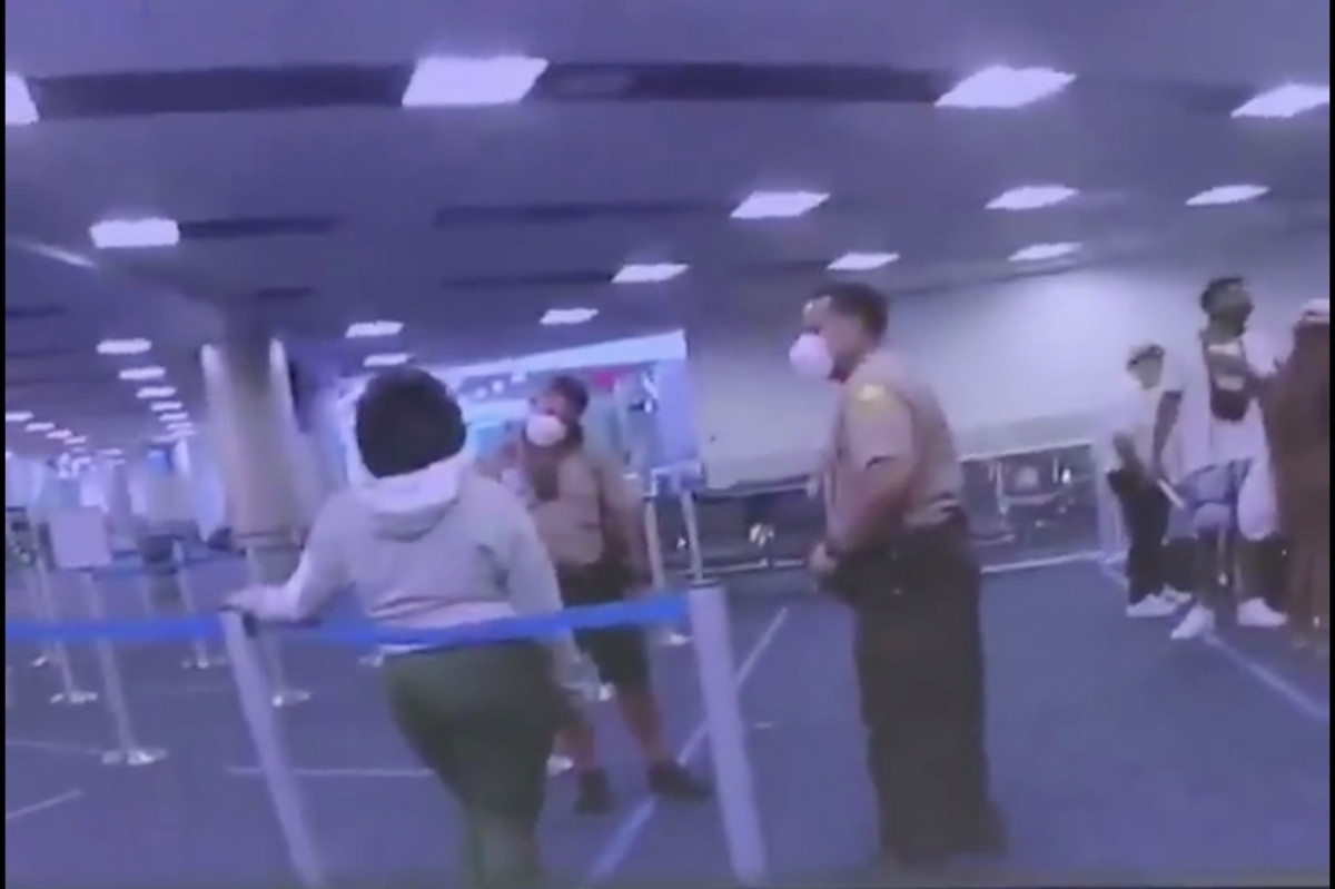 Cop slugs woman in the face at Miami International Airport, video shows