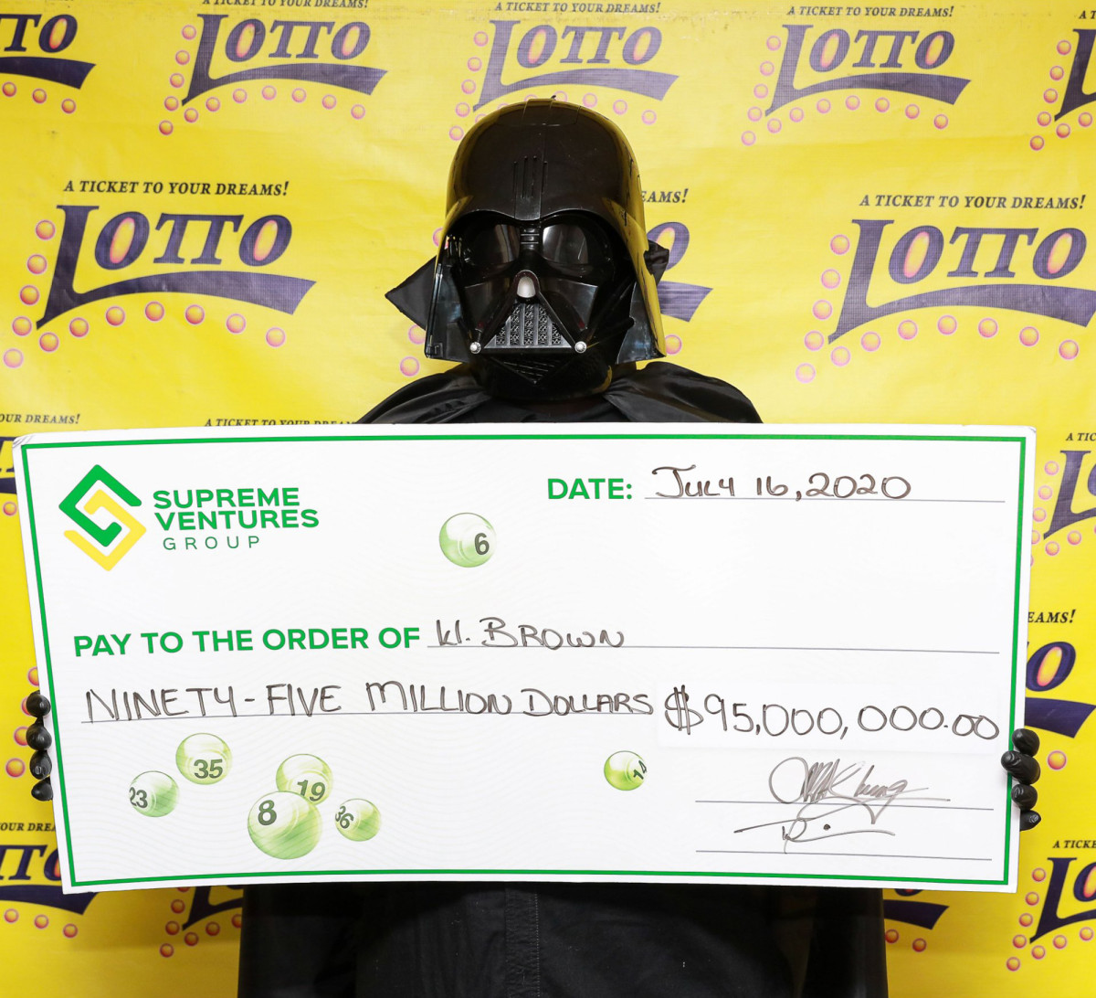 Jackpot winner collects winnings dressed as Darth Vader