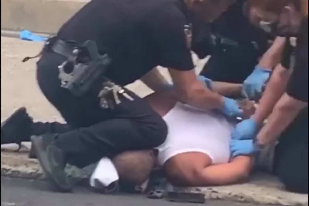 Pennsylvania police probing video of cop kneeling on man's neck