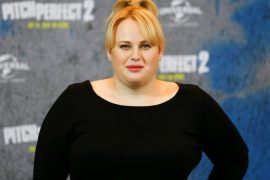 Rebel Wilson shows off her weight loss transformation in smoldering yellow sundress