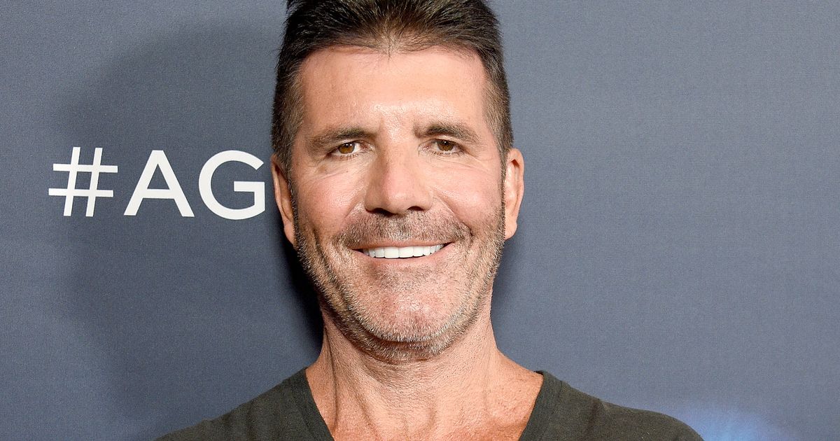 Simon Cowell's brother Tony slaps the star on the cheek for a bad bike accident

