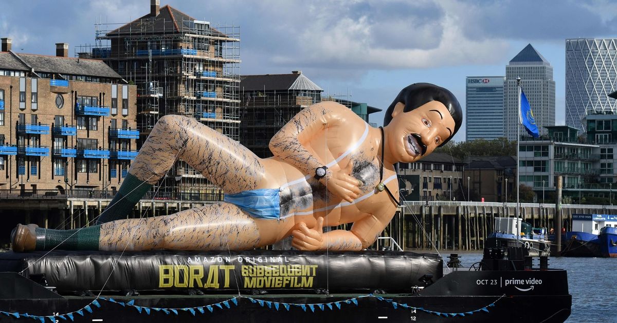 Giant Borath, wearing a trademark monkey, saw the bursting Thames flowing down the Thames

