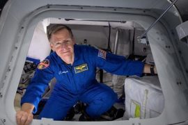 Senior astronaut disembarks from Boeing Commercial Crew Test aircraft