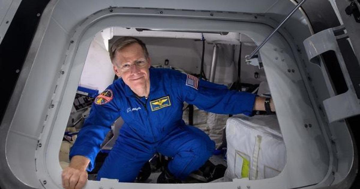 Senior astronaut disembarks from Boeing Commercial Crew Test aircraft

