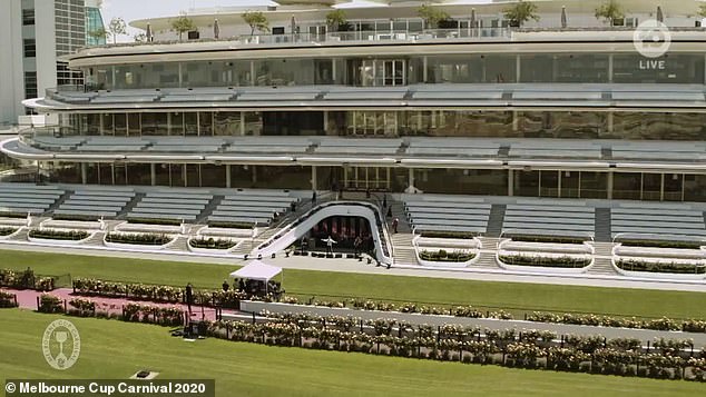 Empty stage: Due to COVID-19 restrictions on public gatherings, no one at the Flemington Racecourse was in the audience to sing with him, resulting in a surreal performance