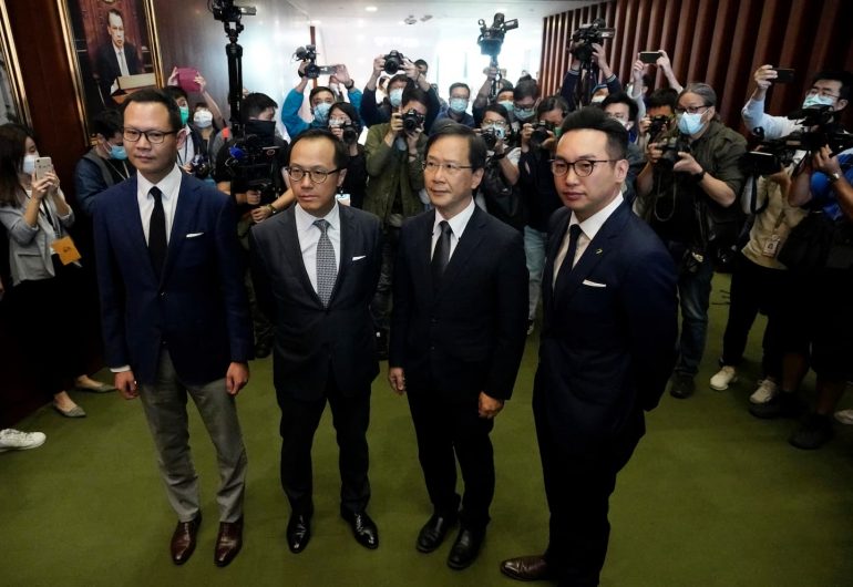Hong Kong expelled pro-democracy lawmakers after China canceled protests