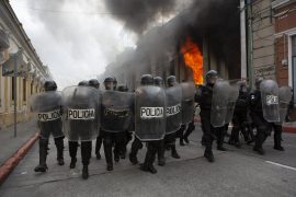 Protesters set fire to part of a Congress building in Guatemala