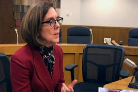 The Oregon governor tells employees to call police for people violating COVID regulations
