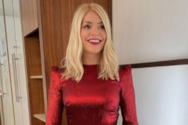 Holy Willoughby surprises fans this morning as she shows off her curves in a skinnymite Christmas dress
