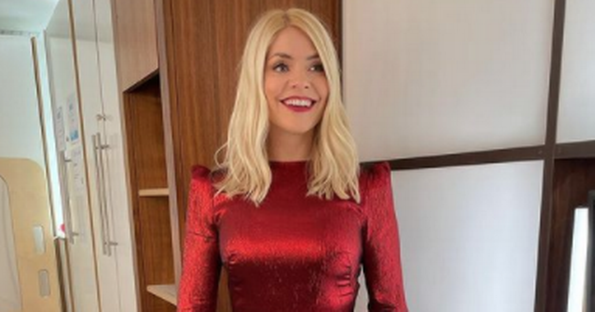 Holy Willoughby surprises fans this morning as she shows off her curves in a skinnymite Christmas dress

