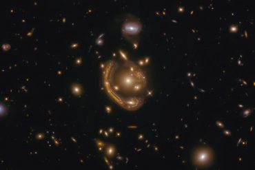 The Hubble Space Telescope captures the largest and most complete "Einstein rings" ever seen