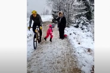 In Belgium, a cyclist creates a video provocation of a little girl being pushed