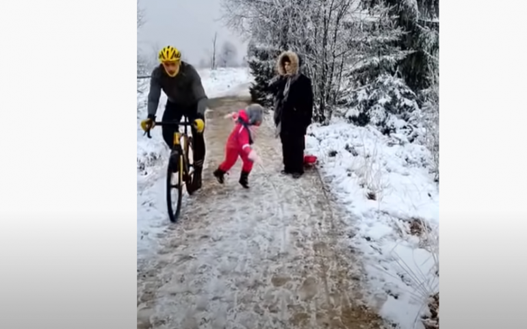 In Belgium, a cyclist creates a video provocation of a little girl being pushed
