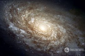 Calculates the distance to the oldest and most distant galaxy in the universe  Science
