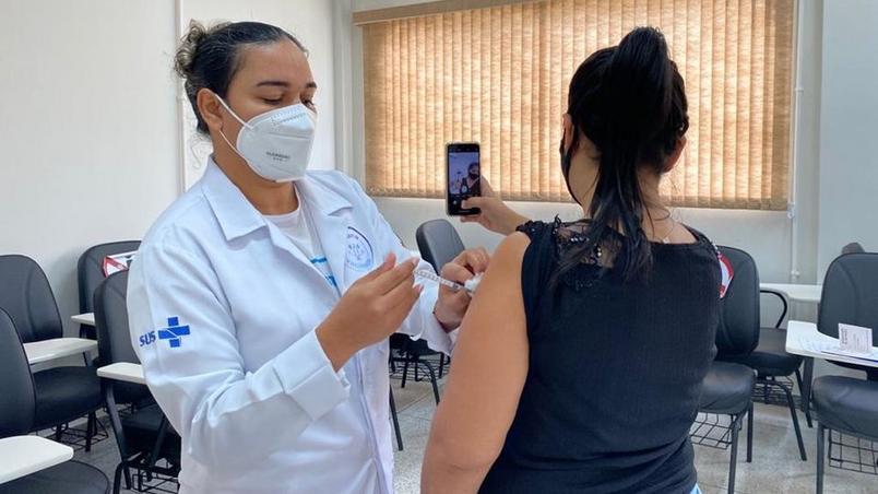 Woman takes selfie while vaccinated