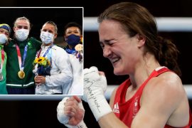 Irish boxing gold medalist Harrington praises "true Olympic spirit" as he invites opponents to the podium at the medal ceremony