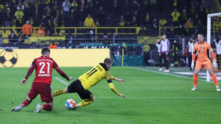 AP - Marco Reus falls in the box against Bayern