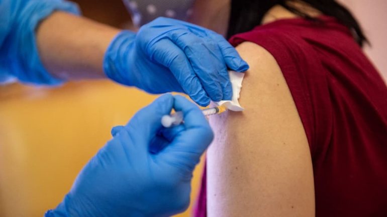 One person is vaccinated against covid 10 times a day