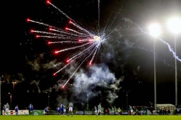 Fans shoot players with fireworks