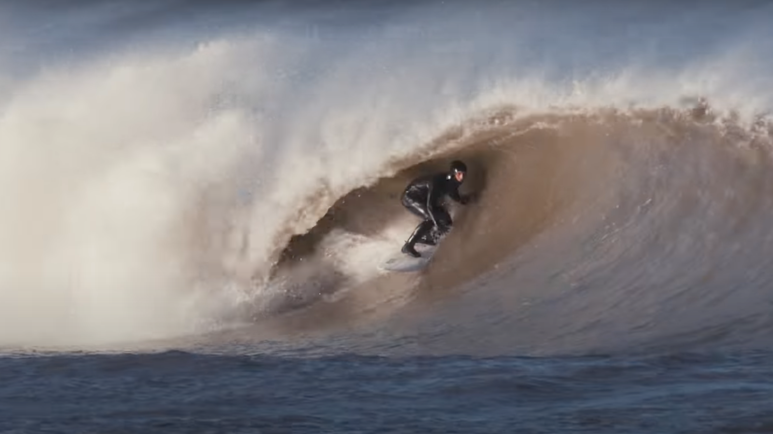 Who told Logan Nicole and Patrick Langdon-Dark at home that there were no waves in Wales?

