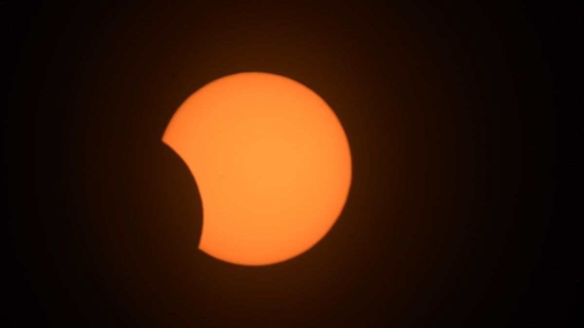 Rare black lunar eclipse strikes the sun in South America

