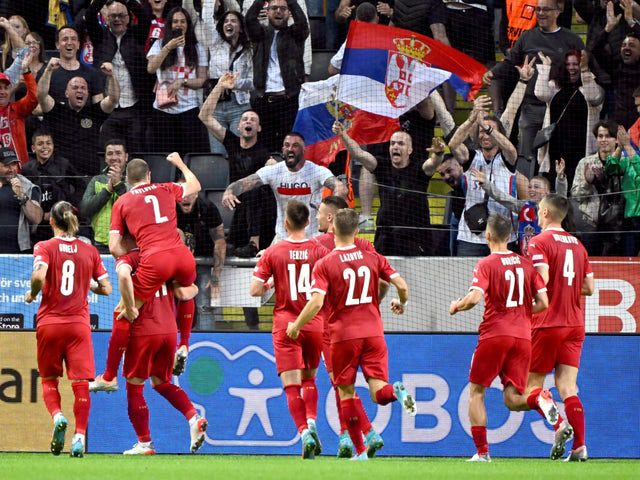Serbia's Luka Jovic celebrates his first goal with his teammates on June 9, 2022.