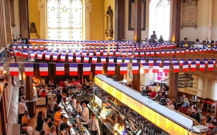 The church in Dublin is decorated with French flags