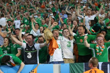 Ireland and Northern Ireland fans receive the Paris Medal of Merit