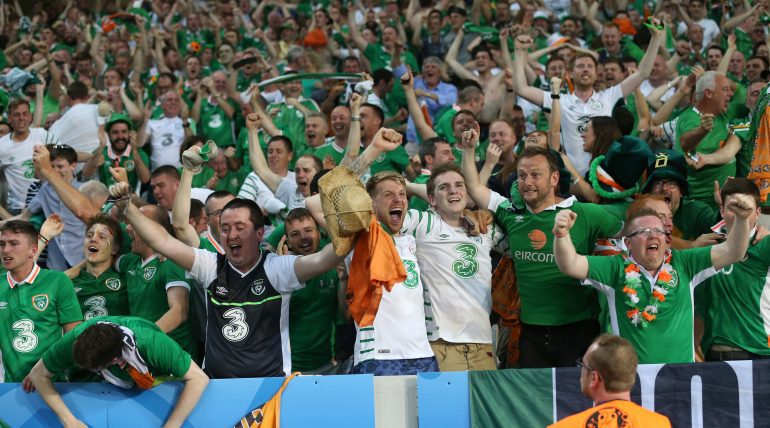 Ireland and Northern Ireland fans receive the Paris Medal of Merit