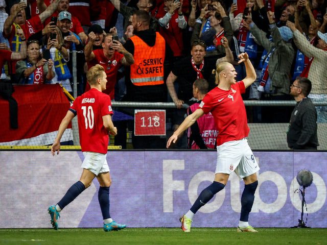 Norway's Earling Brout Holland celebrates his first goal with Martin Odegod on June 5, 2022