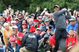 Tiger Woods celebrates in Ireland ahead of the 150th British Open at St Andrews.