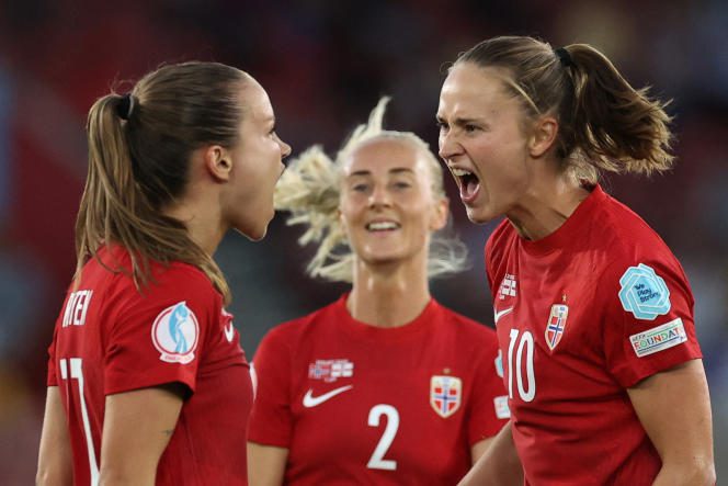 Norway's Guro Reiten (left) and Caroline Graham Hansen (right) celebrate a goal under the eyes of their teammate Anja Sonstevold during their Euro 2022 win over Northern Ireland (4-1) at St. Mary's Stadium on July 7.  , Southampton. 