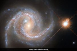 Hubble Telescope Captures Image Of Spiral Galaxy, Milky Way Stars Photobomb It
