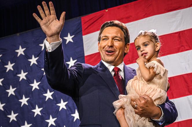 Republican Florida Governor Ron DeSantis and his daughter during the party's election night on November 8, 2022 at the convention center in Tampa, Florida. 