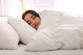 Sleeping under a heavy blanket can help produce more melatonin